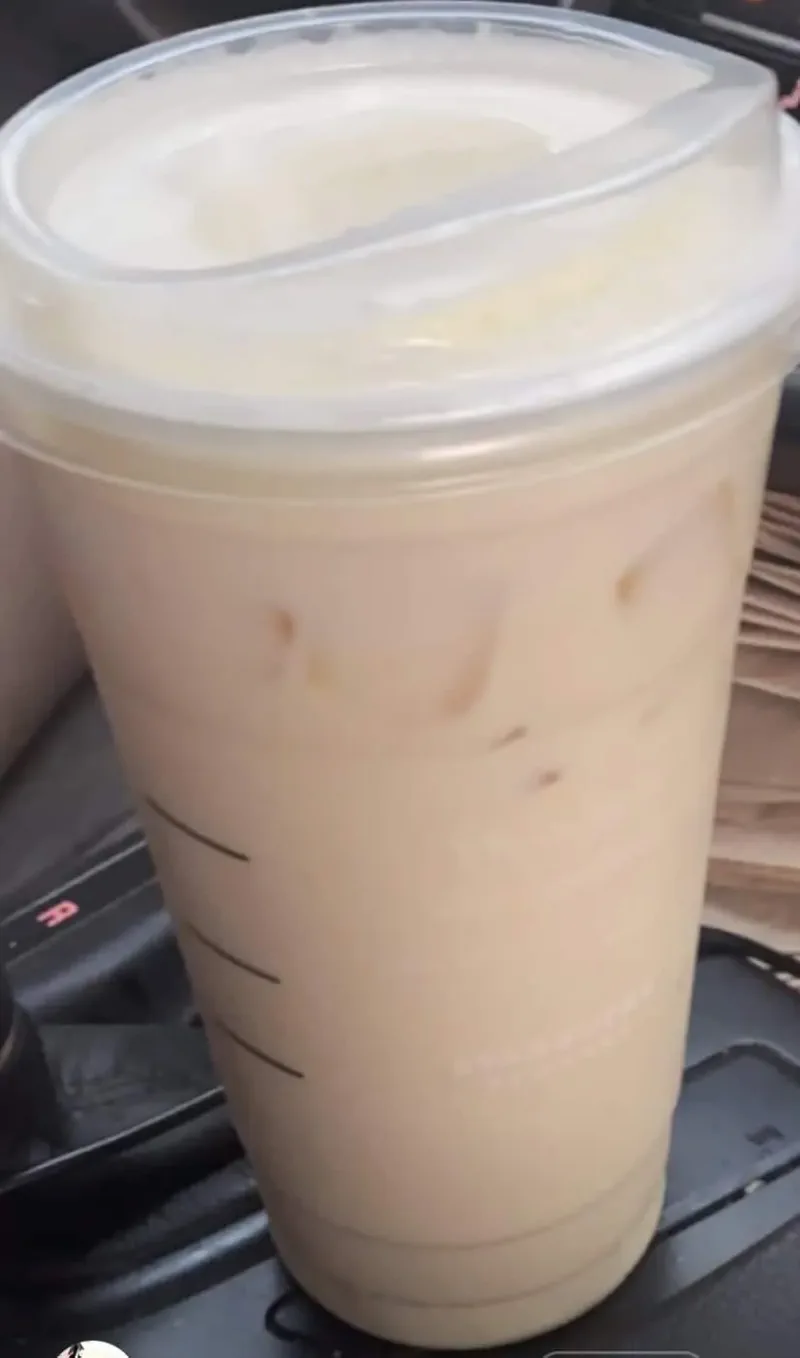 starbucks venti pineapple refrehser with peach juice and heavy cream (1)