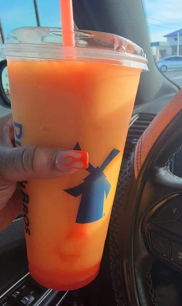 Peach Smoothie With Strawberry Drizzle