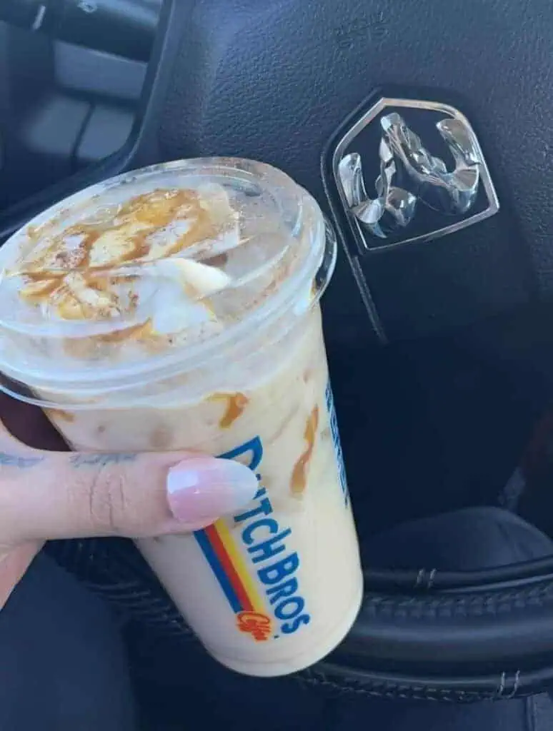 medium iced banana bread chai with a domino shot caramel walls and the works