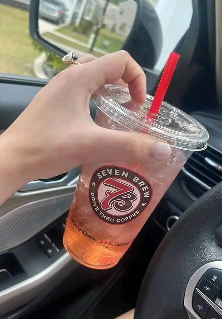 7 fizz with strawberry, pineapple, passion fruit, and kiwi