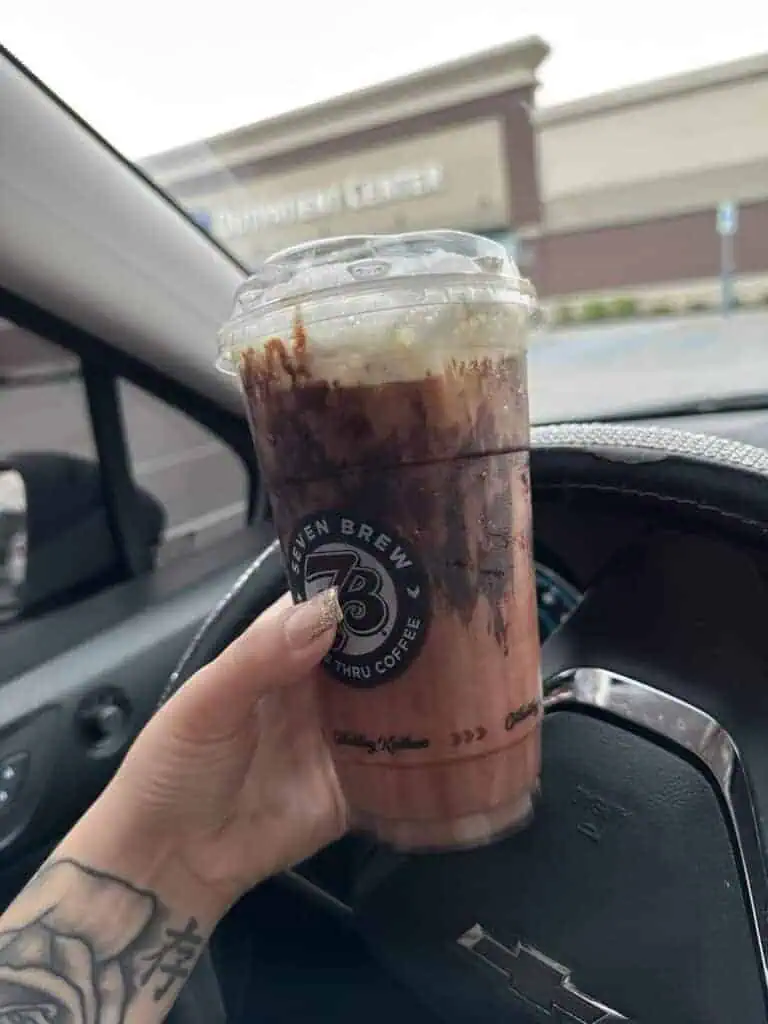 Macchiato with strawberry syrup and chocolate drizzle