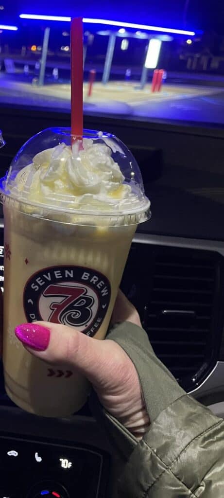 Peaches ‘n Cream smoothie with white chocolate drizzle and whipped cream