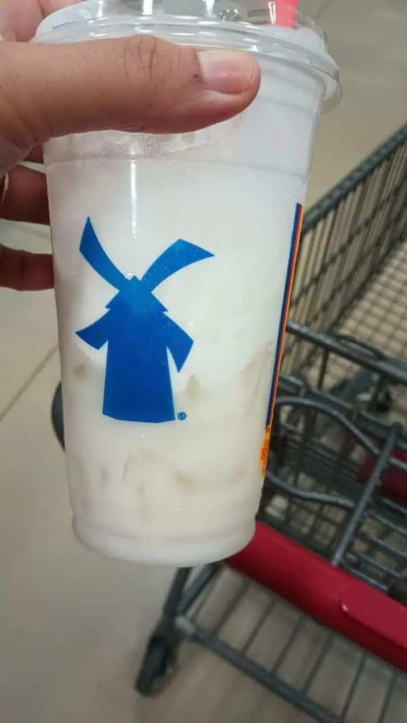 Coconut green tea with coconut milk & coconut flavoring with Coconut cold foam