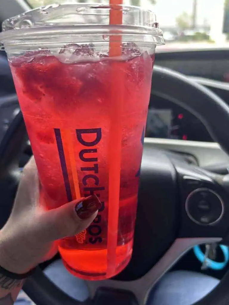 Iced green tea with watermelon & peach xrra sweet with real strawberry top