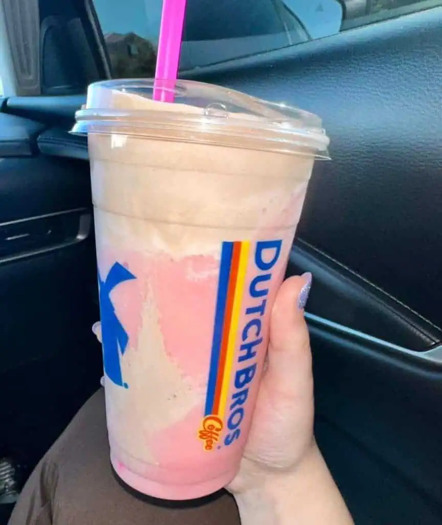 White chocolate raspberry freeze w: white coffee, double blended, parfait style w: chocolate soft top