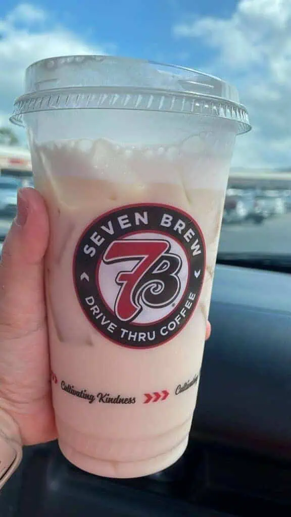 iced chai latte with peach and vanilla flavoring with sweet cold foam