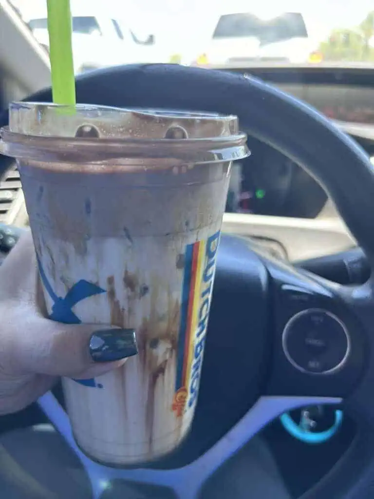 iced white coffee golden eagle with chocolate soft top with  caramel and chocolate walls