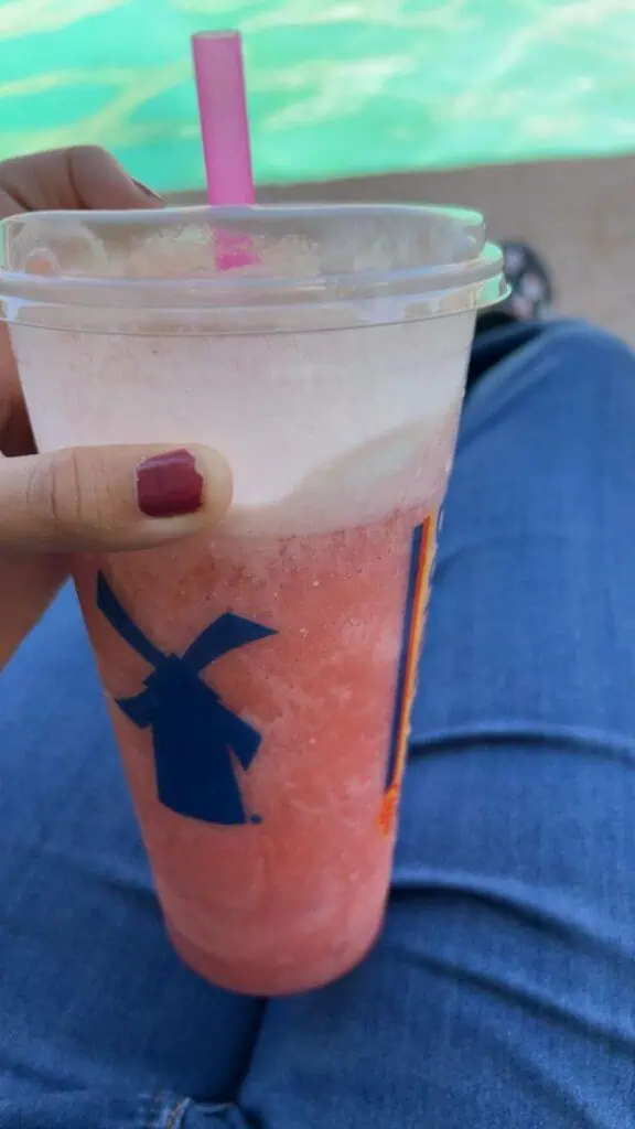 strawberry banana coconut smoothie with whip cream