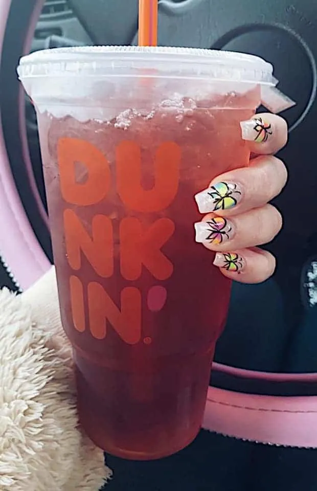 strawberry dragon fruit refresher with extra dragon fruit and sweet tea