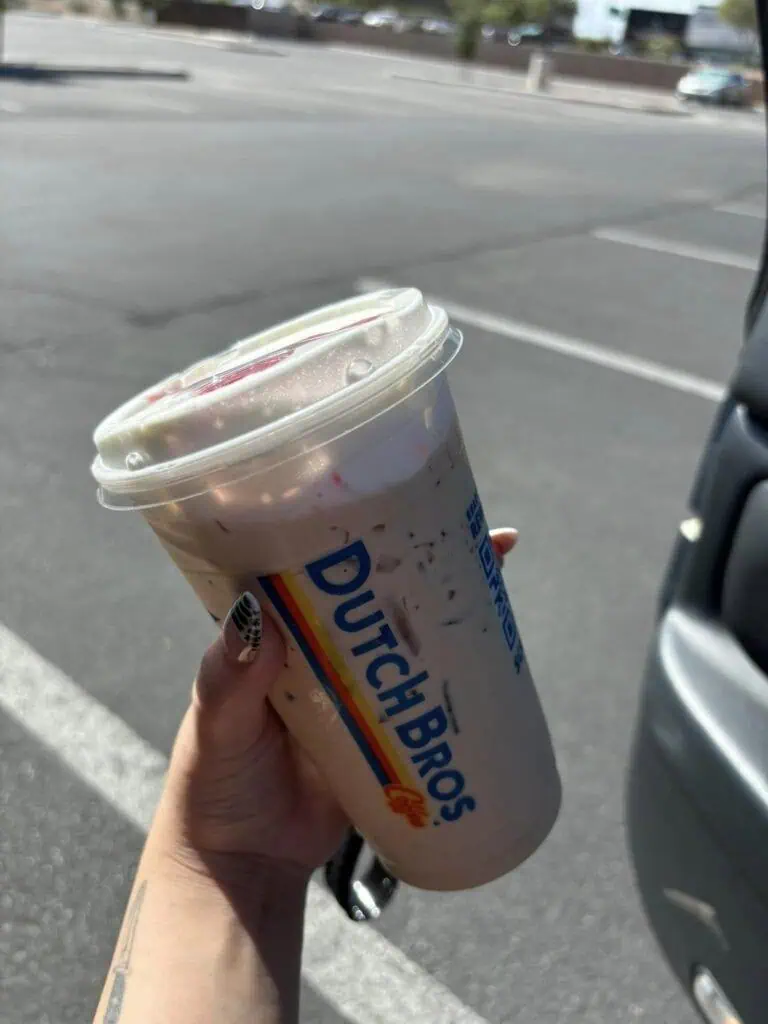 strawberry white coffee breve with vanilla and white chocolate with soft top and strawberry puree