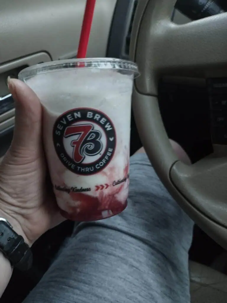 Pina colada shake with strawberry drizzle
