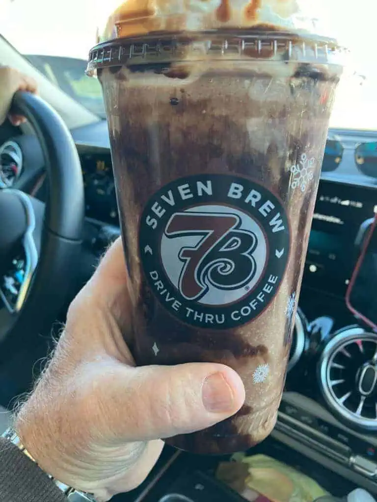 chocolate shake with whipped cream and chocolate drizzle