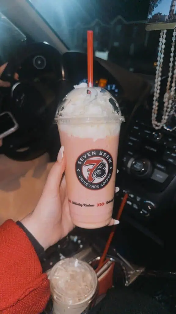 raspberry & vanilla shake with whip & white chocolate drizzle